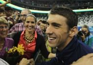 Michael Phelps of the United States smiles with sister Hilary Phelps after the Men's 4x200m Freestyle during Day Fourteen of the 14th FINA World Championships at the Oriental Sports Center on July 29, 2011 in Shanghai, China. (Photo by Ezra Shaw/Getty Images)